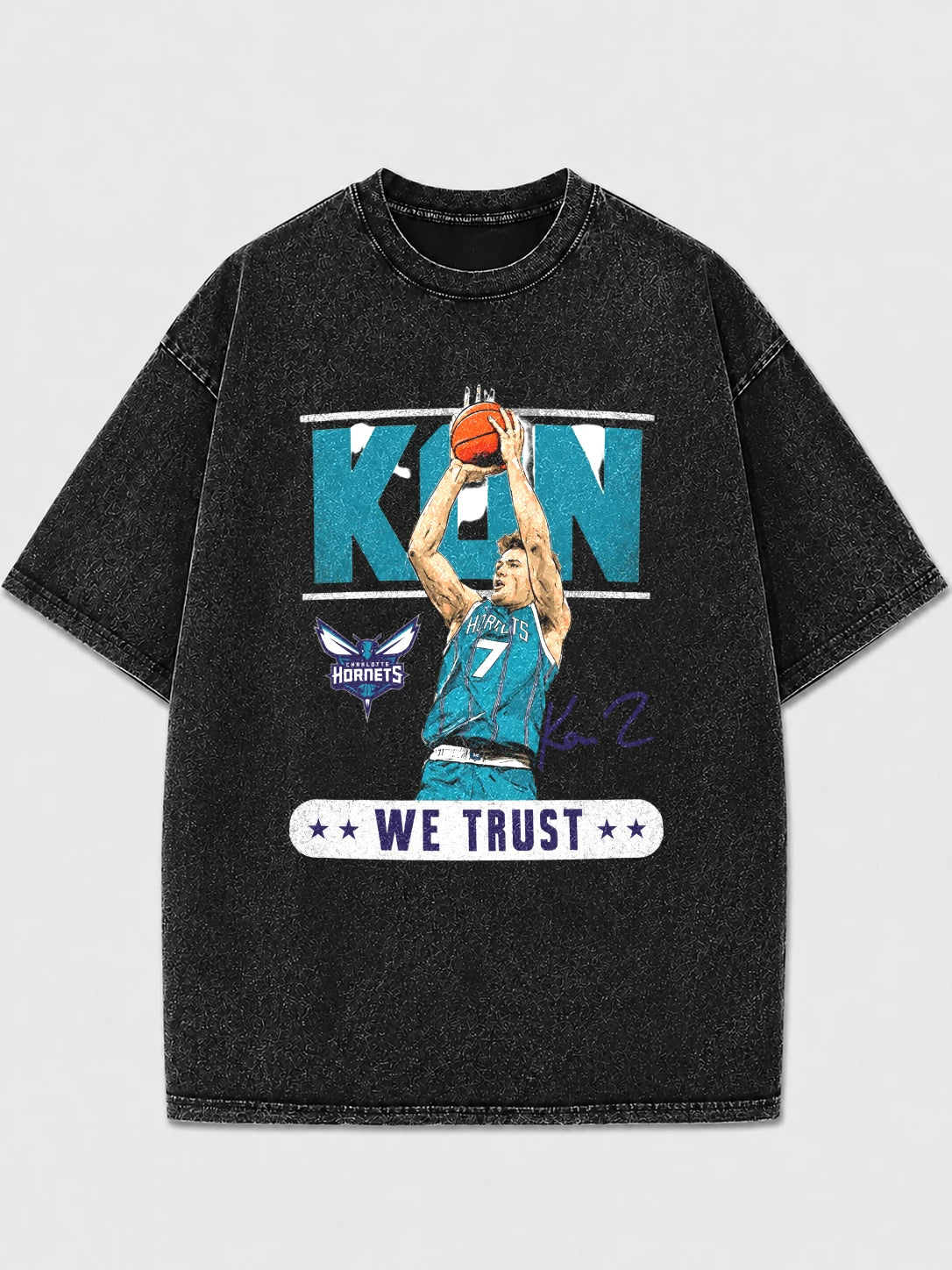 Model wearing a vintage black basketball graphic tee with a bold design