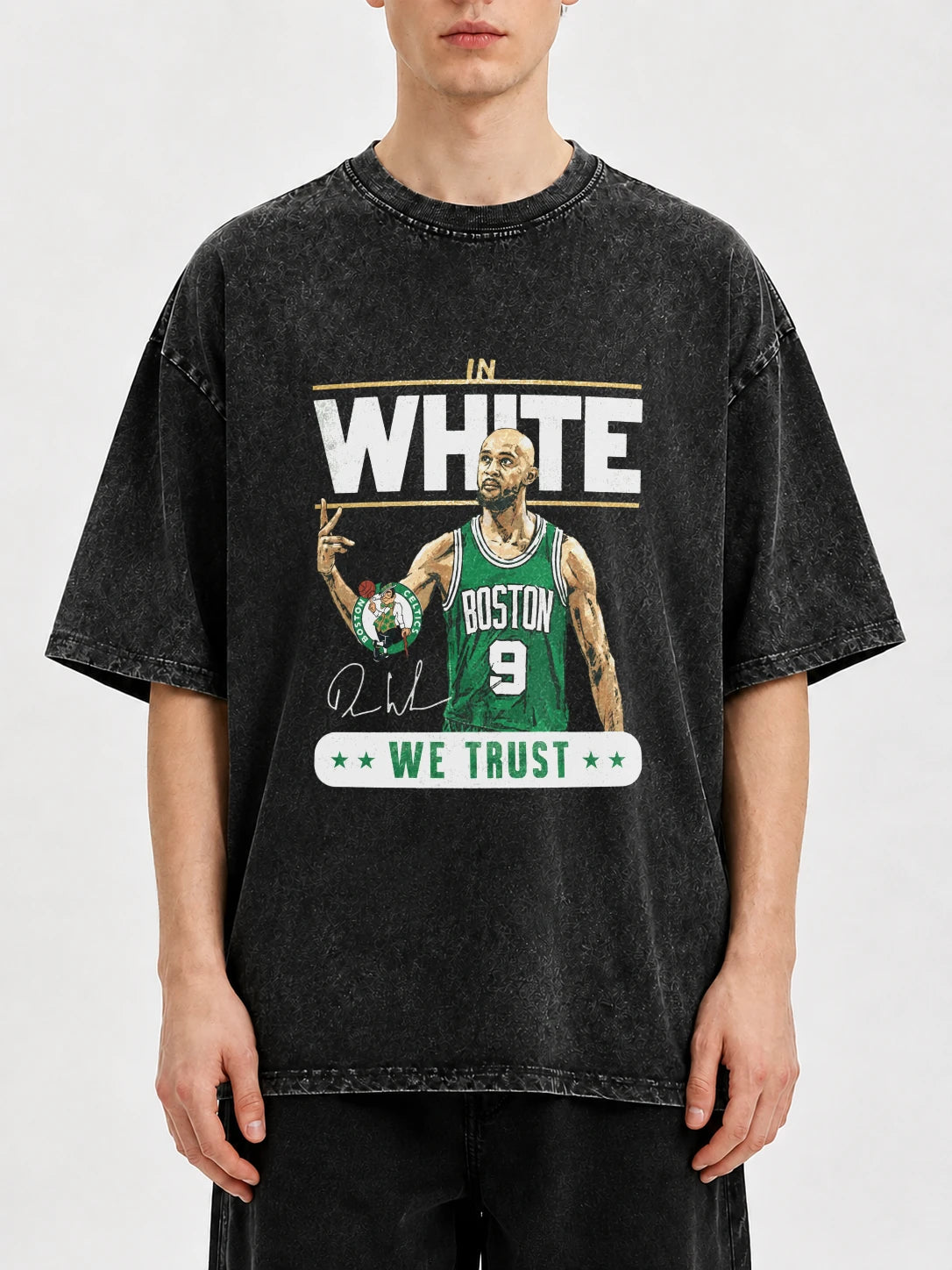 Man wearing a retro Boston basketball graphic tee with a distressed finish.