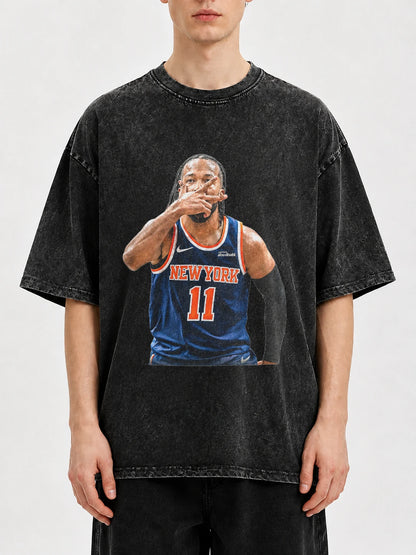 Vintage black graphic basketball tee featuring player design