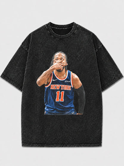 Vintage black graphic basketball tee featuring player design