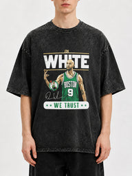 Man wearing a retro Boston basketball graphic tee with a distressed finish.