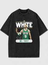Man wearing a retro Boston basketball graphic tee with a distressed finish.