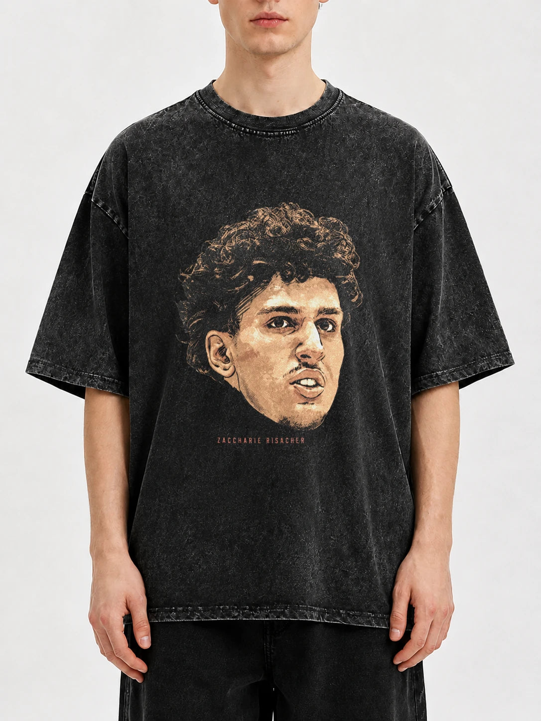 Man wearing a black oversized t-shirt with vintage graphic print