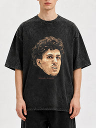 Man wearing a black oversized t-shirt with vintage graphic print