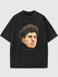 Man wearing a black oversized t-shirt with vintage graphic print