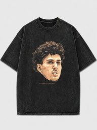 Man wearing a black oversized t-shirt with vintage graphic print