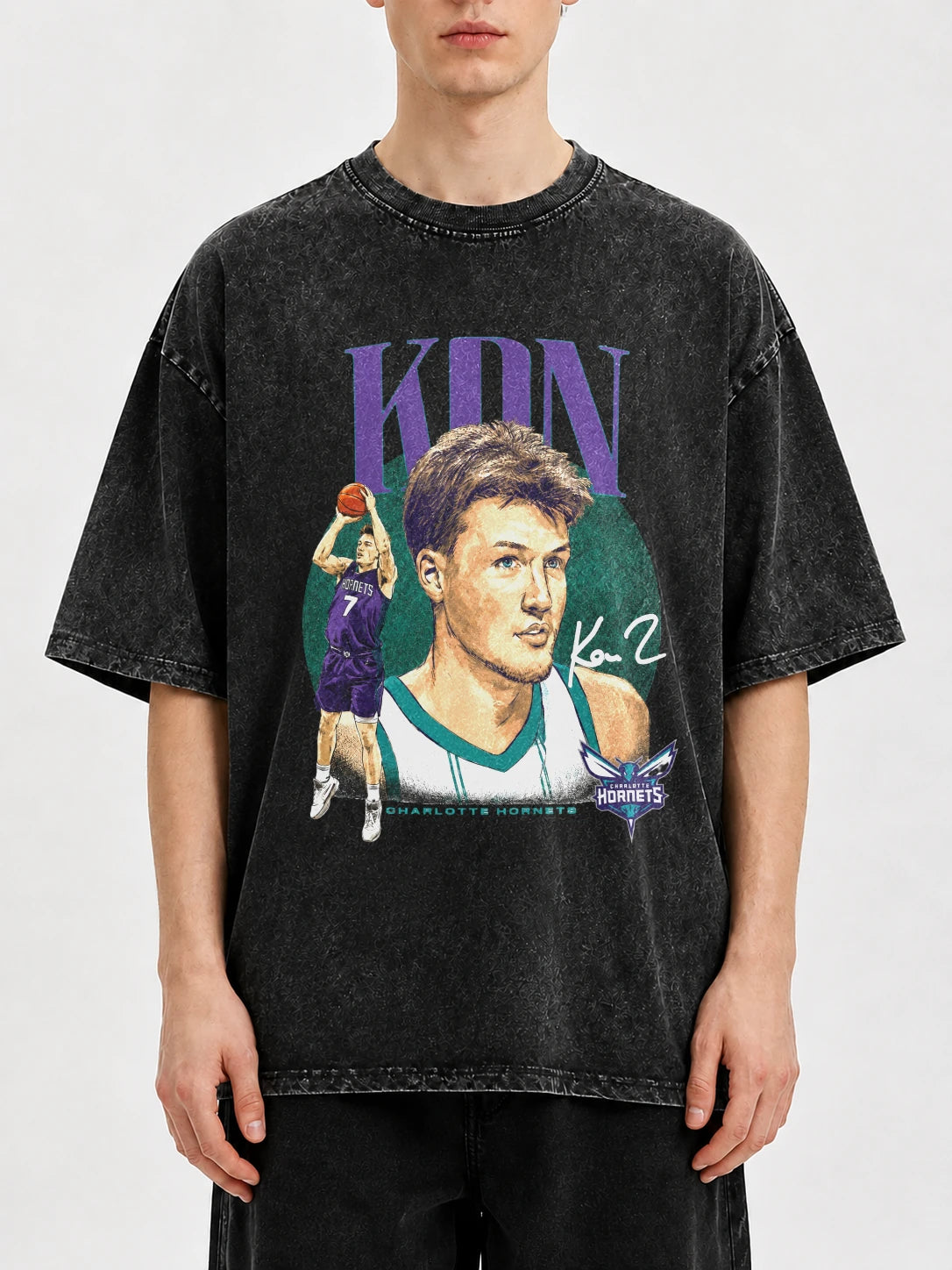 Oversized vintage NBA graphic t-shirt featuring bold artwork.