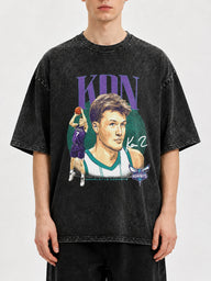 Oversized vintage NBA graphic t-shirt featuring bold artwork.