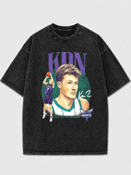 Oversized vintage NBA graphic t-shirt featuring bold artwork.