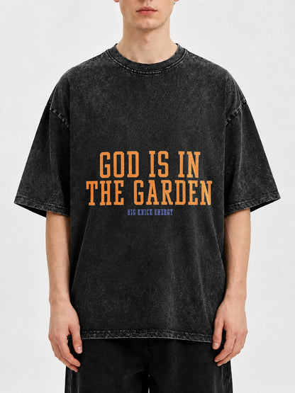 Oversized black graphic tee with 'God Is In The Garden' print
