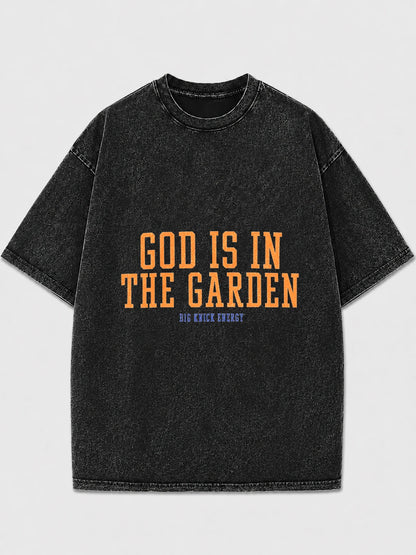 Oversized black graphic tee with 'God Is In The Garden' print