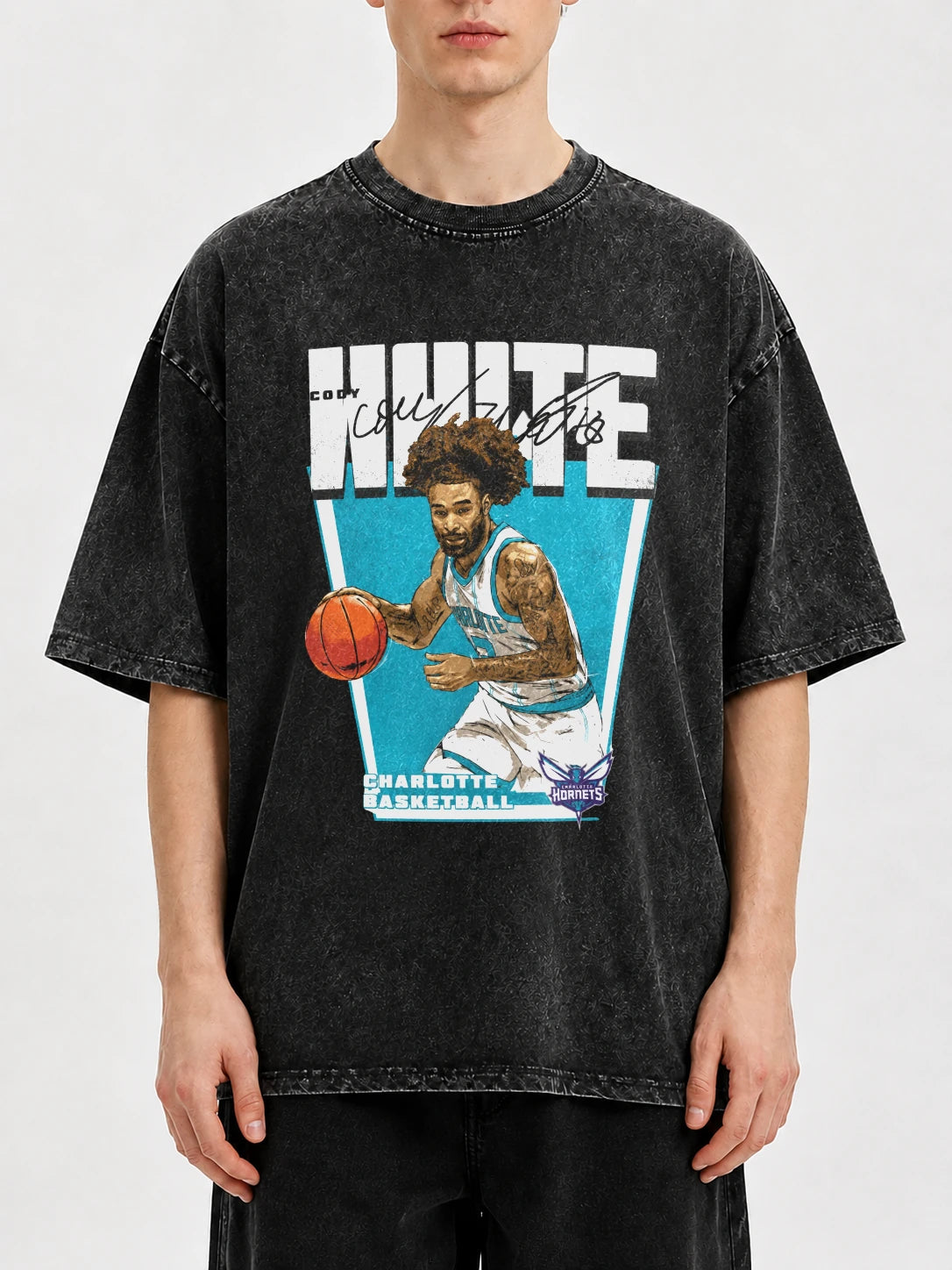 Model wearing a vintage basketball graphic t-shirt in gray.