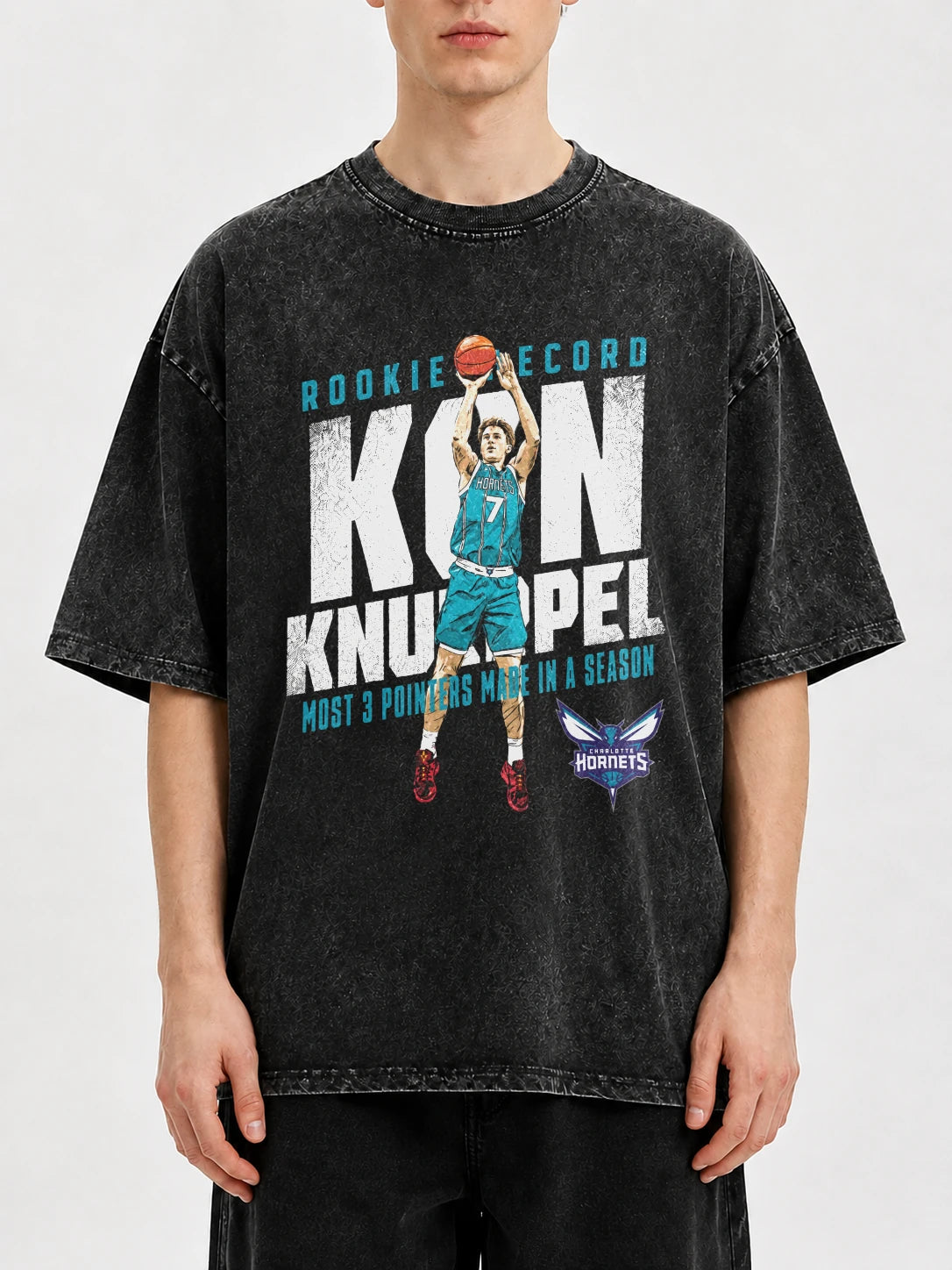 Vintage basketball graphic tee in faded black with player design